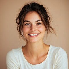Joyful young woman smiling portrait indoor setting lifestyle photography neutral background upbeat concept for personal branding