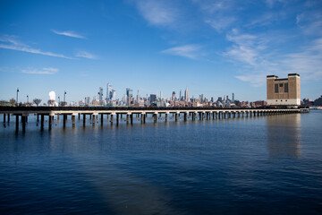 Fototapeta premium New York, United States. Panorama view of New York city skyline in Midtown Manhattan. USA, NYC, NY, Manhattan. American big city. Lower Manhattan skyline. New York from New Jersey.