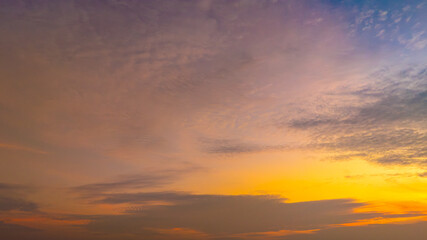 Enjoy a panoramic view of the skyline. The sun rises in the morning sky with colorful clouds. and beautiful cloud patterns In the soft light of the morning	
