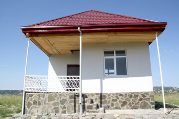 A watchman's house built in the mountains. A stone house built for hunters to spend the night.