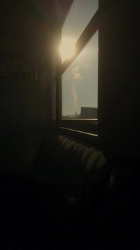 Japan Enjoy the serene sunset through a train window as it passes through tunnels, blending the beauty of travel with the peaceful charm of Japan's scenic railway journeys.
