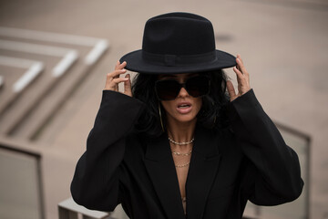 Portrait of beautiful smiling young woman hat. Sensual woman posing. Background. Face. Photo. Model. 