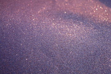 purple shining glitter background.