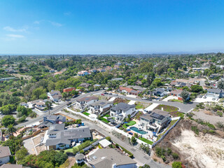 Aerial view of middle class houses in the valley of Oceanside town in San Diego, California. USA.