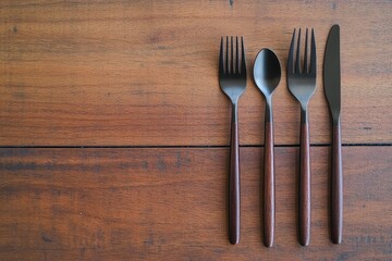 Minimalist cutlery set on a wooden table