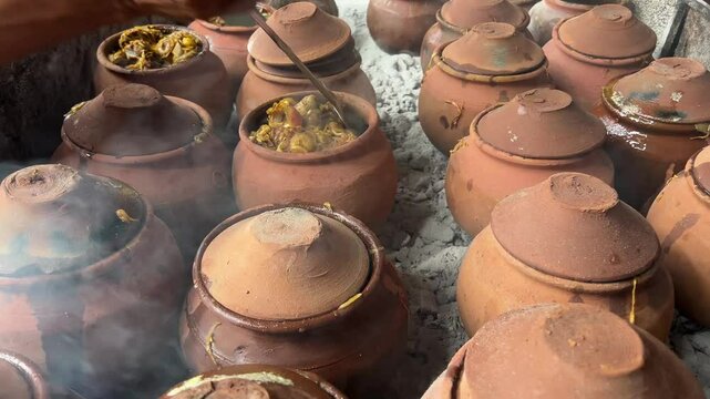 Rows of earthen pot used in making Champaran mutton in Bihar