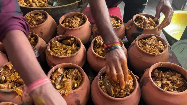 Men are preparing Handi Champaran mutton in Bihar