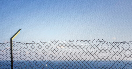 Fence with a light post on the left side