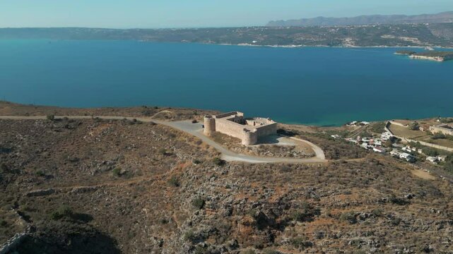 Small Ottoman Stone Fortress Above The Cretan Sea In Greece Drone Circling 4K 60FPS