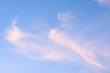 Beautiful pink clouds on blue sky in summer travel
