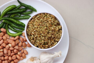 Hirvi Mirchi cha thecha, Dry green chutney made from garlic chilli peanuts which is famous in maharashtra
