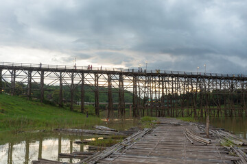 Uttamanusorn Bridge commonly known as Wooden Mon Bridge is famous that the longest wooden bridge in Thailand located in Sangkla Buri, Kanchanaburi.