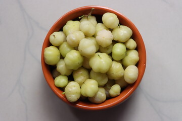 Rai aamla, Indian Gooseberry or phyllanthus acidus fruits 