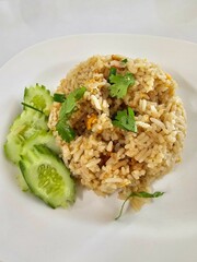 Thai fried rice in white plate On white background