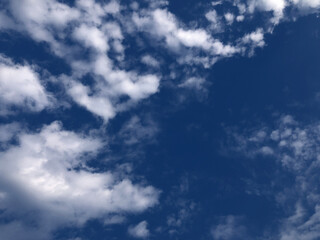 clouds on Dark blue sky bright cloudscape dramatic atmosphere outdoor environment