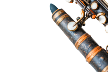Clarinet Close-up:  The intricate details of a vintage clarinet are highlighted in this close-up photograph.  The aged wood and gleaming metal accents create a sense of history and artistry.