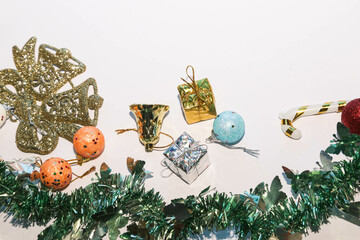 Season's greetings scene. Christmas decorations,gift boxes with red ribbons, сhristmas balls, ...