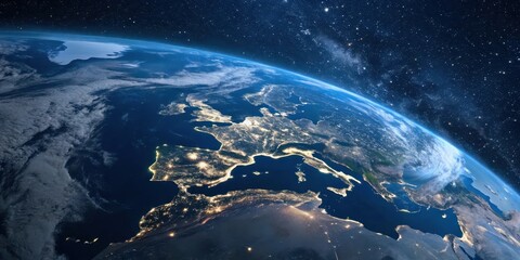 A breathtaking view of Earth's nocturnal lights illuminating a vast expanse of land and sea from outer space