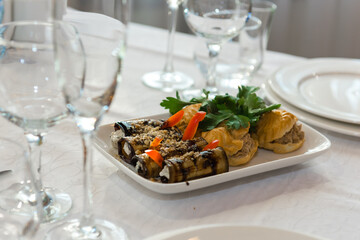 Cold meat snack food. A dish on the festive table.