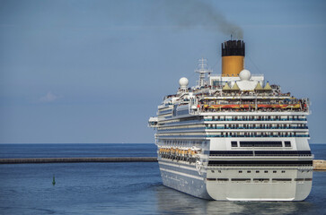Gigantic cruiseship cruise ship liner Fascinosa sail away departure from old town Valletta, Malta...