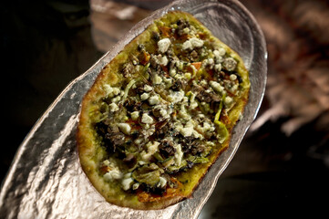 Fresh Flying Pizza  on a Plate