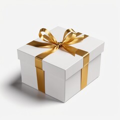Obraz premium white gift box with gold ribbon isolated on white background cutout