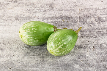Ripe green mini eggplants heap