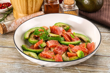 Salad with avocado and salmon