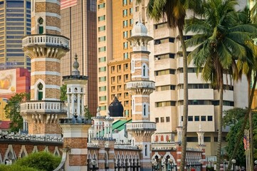 Architectural diversity of Kuala Lumpur with the Sultan Abdul Samad Jamek Mosque, Malaysia