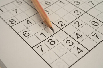 Sudoku puzzle, game to play for keep you brain younger for developing Alzheimer disease in senior patient.