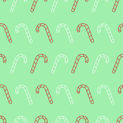 Vector seamless pattern with white and red candy canes on a light green background