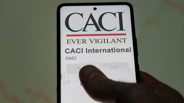 March 26th 2024, logo of CACI International on a white wall in a hall building, the $CACI brand indoor.
