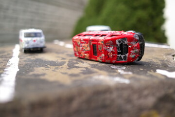 traffic accident. broken car. flipped car. Accident with two white broken cars. An overturn car...