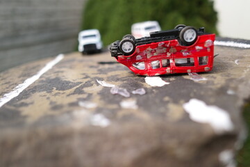 traffic accident. broken car. flipped car. Accident with two white broken cars. An overturn car...