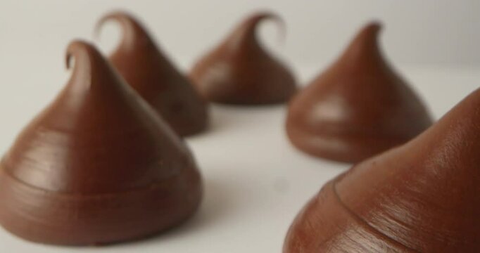 A close-up of the drop-shaped chocolates