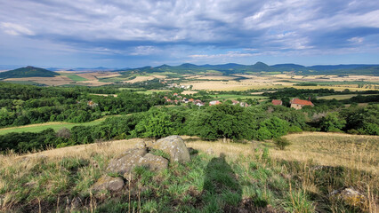 Fototapeta premium View of the landscape of the Bohemian Central Highlands from Holý vrch mountain. There is a great view in all directions from here.