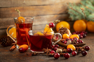 Winter drinks with ingredients on a old kitchen table.