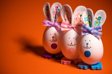 Easter eggs. funny hares. toy rabbit. toy egg. statuette easter bunny.