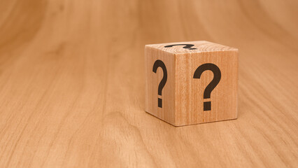 Mystery Block Positioned on Wood Surface A Theme of Uncertainty with Creative Exploration