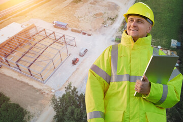 Worker in high-visibility jacket at construction site