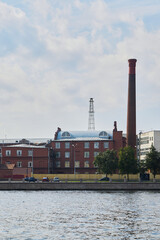 An Industrial Complex located by the River featuring Historic and Notable Architecture