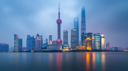 Quiet skyscrapers illuminated by faint city lights under the cloudy, serene sky of New Years night.