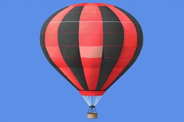 Obraz premium A red and black striped hot air balloon is floating in the sky