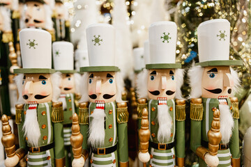 Handmade wooden Christmas nutcracker toys at traditional Christmas market. Nutcracker figurines and Christmas decorations