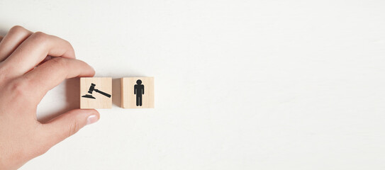 Human figures with a judge gavel. Human rights law