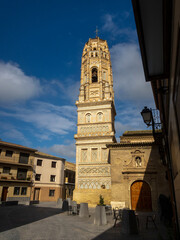 Vertical view of the impressive Mudejar tower of the small town of Utebo in Aragon on a sunny day.