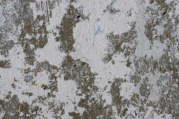 Old wall with cracked stucco. Weathered rough surface. Vintage texture great for background and design.