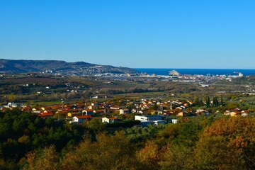 Fototapeta premium View of Dekani village and the port town of Koper at the coast of the Adriatic sea in Istria and Littoral region of Slovenia