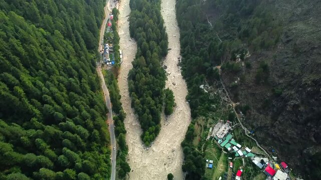 Aerial view of himalayan mountains at kasol himachal pradesh. Small villages and colorful local houses nested in the hills of parvati valley at kasol, himachal pradesh, India.