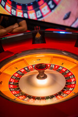 Close up shot of a spinning roulette. Presentation of a luxury casino roulette wheel. Gambling. Lucky game